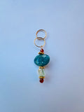 Charm gold Turquesa